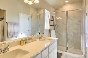 Combined shower/tub, hair dryer, towels, soap