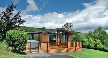 Timber clad holiday home with one double and one twin.