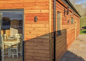 Outdoor dining - A beautiful bespoke lodge perfect for a family escape. (Gledrid, Chirk)