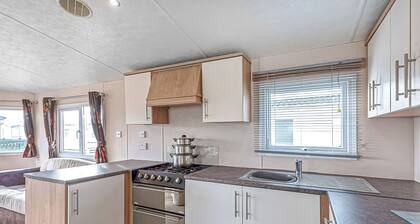 12ft-wide quality caravan with one double and two twin.