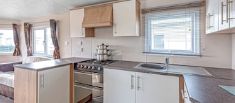 12ft-wide quality caravan with one double and two twin.