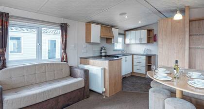 12ft-wide quality caravan with one double and two twin.