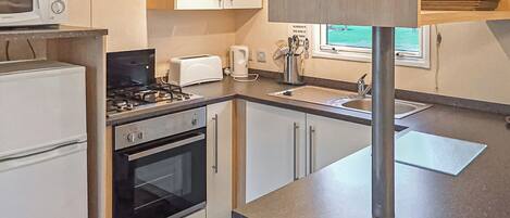 Kühlschrank, Ofen, Herdplatte, Toaster