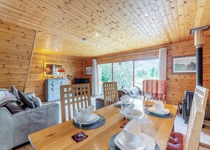 Dining - Ground floor: Spacious open plan lounge, kitchen, dining area with log burner. (Anglesey)