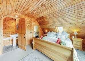 Unclassified image, 5 of 27, button - Ground floor: Spacious open plan lounge, kitchen, dining area with log burner. (Anglesey)