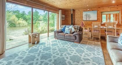 Ground floor: Spacious open plan lounge, kitchen, dining area with log burner.