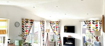 Spacious lodge with one master double and two twin.