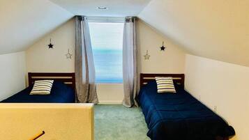 1 bedroom, desk, iron/ironing board, travel crib