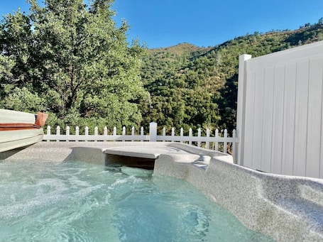 Outdoor spa tub. Eagle Nest - River Views/Hot Tub/Games/Sleeps 6