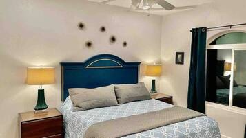 1 bedroom, desk, iron/ironing board, travel crib