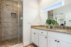 Combined shower/bathtub, hair dryer, towels, soap