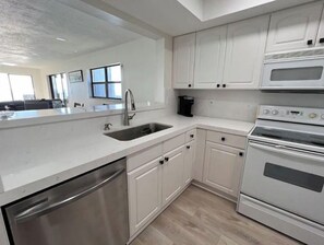 Fridge, microwave, oven, stovetop - Spectacular ocean front 2-bedroom condo (Jensen Beach)