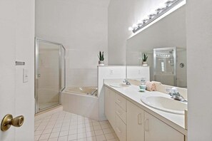 Bathtub, hair dryer, towels