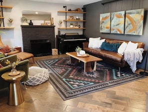 Smart TV, fireplace, books