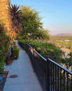 Stroll through the serene garden, surrounded by lush plants and flowers, and enjoy the tranquil atmosphere.