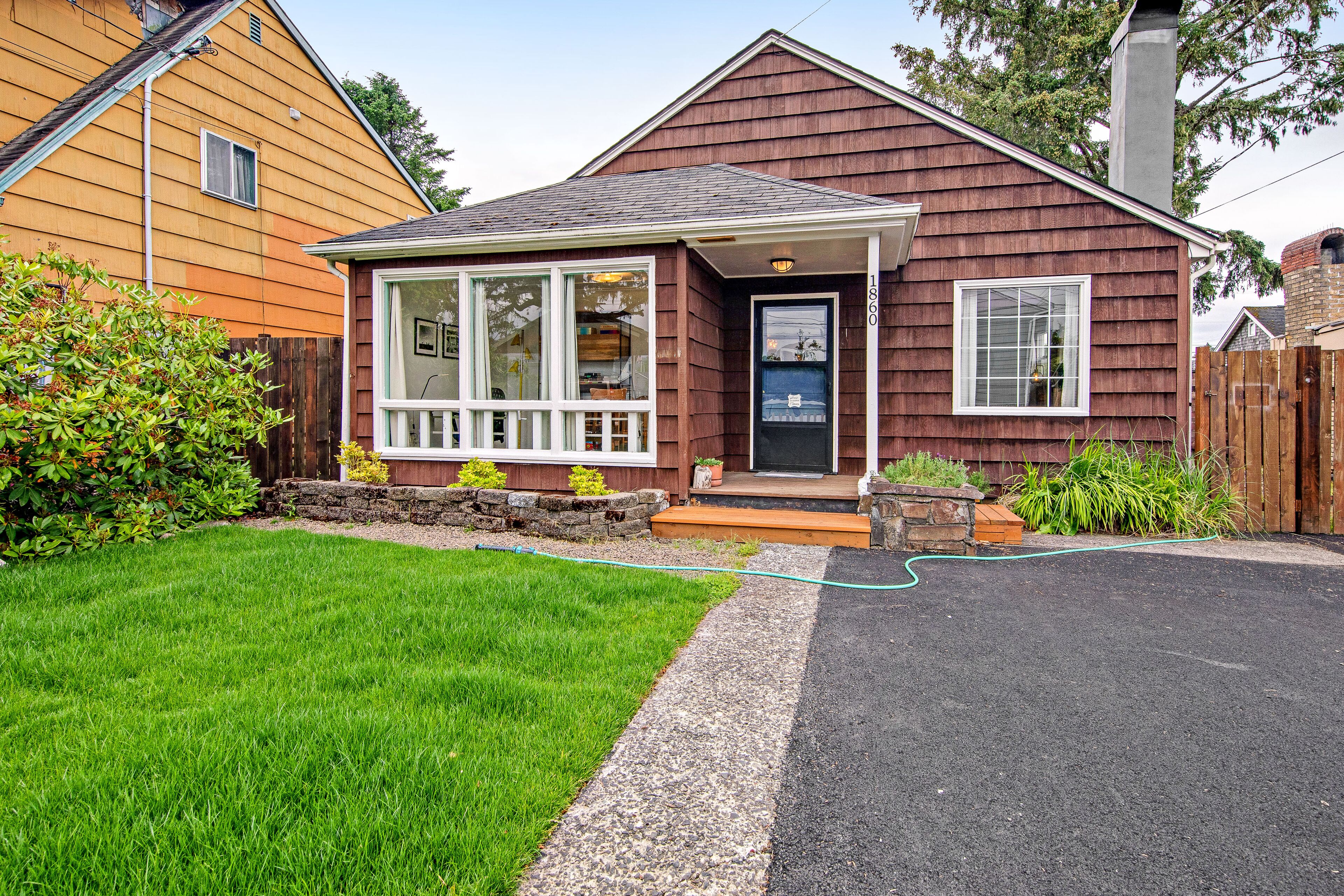 Eclectic dog-friendly house with beach gear, enclosed yard, & washer/dryer