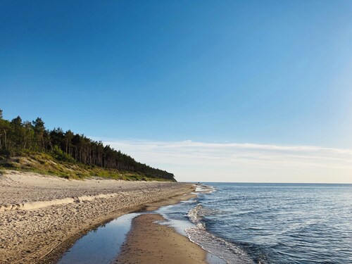 Beautiful vacation apartment. Top floor near the beach & quiet location to relax