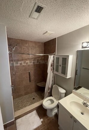 Combined shower/bathtub