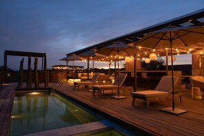 Outdoor pool, pool umbrellas, sun loungers