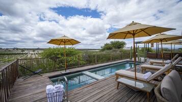 Outdoor pool, pool umbrellas, pool loungers