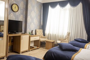 Habitació triple Elite | Llençols de cotó egipci i roba de llit d'alta qualitat 