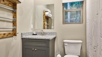 Deluxe Villa, 2 Bedrooms, Kitchenette, Mountainside | Bathroom | Combined shower/bathtub, hair dryer, towels, soap