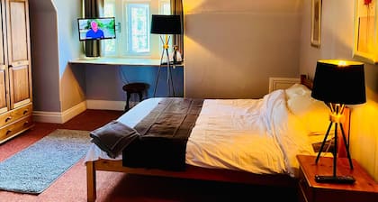 Tidy rooms above period local pub