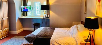 Tidy rooms above period local pub