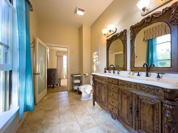 A spacious bathroom with a large vanity, double sinks, and a large mirror. - Cozy Queen Mansion RM Near Monterey Carmel (Salinas)