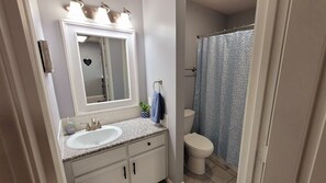 Combined shower/bathtub, hair dryer, towels, soap