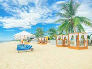 Private beach, sun loungers, beach towels, beach volleyball