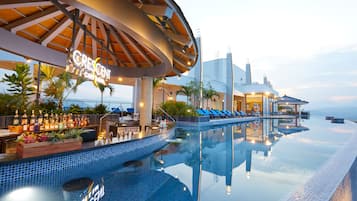 3 bars/lounges, poolside bar