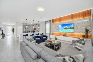 Télévision à écran plat, console de jeux vidéo