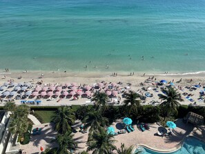On the beach, sun loungers, beach towels