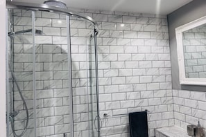 Shower, hair dryer, towels