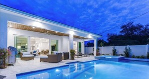 A heated pool - Calming Waters | Pool, Spa & Beach Days Await (Naples)