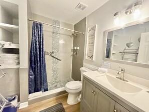 Shower, hair dryer, towels