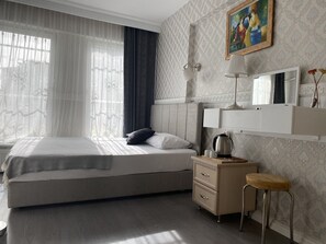 Economy Quadruple Room | Egyptian cotton sheets, premium bedding, memory foam beds, in-room safe - antik sofia hotel (Istanbul)