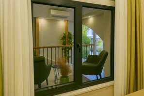 Habitación doble económica, 1 cama King size | Ropa de cama de alta calidad y minibar 