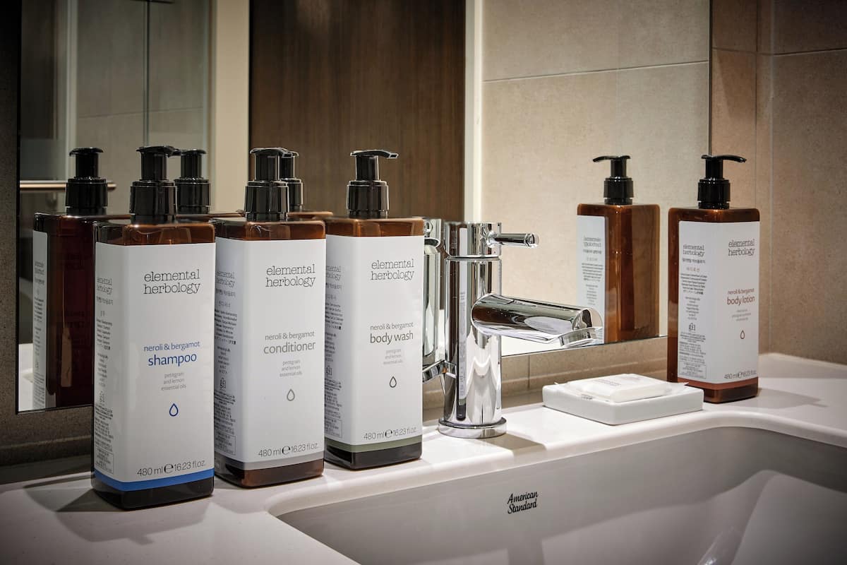 shower, hair dryer, bathrobes, slippers