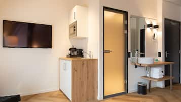 Habitación doble superior | Cocina privada | Frigobar, cafetera de espresso, cafetera y tetera y tetera eléctrica
