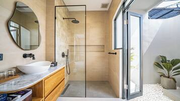 Villa, 1 Bedroom, Bathtub | Bathroom | Shower, rainfall showerhead, hair dryer, bathrobes