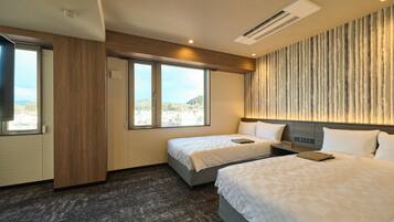 A hotel room with two beds, a large window with a view, a wall-mounted air conditioner, and a flat-screen TV.