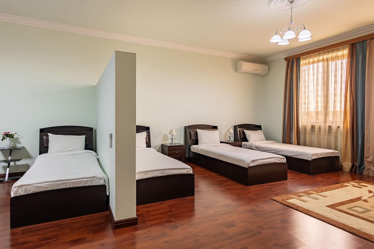 family room | 1 bedroom, in-room safe, desk, laptop workspace