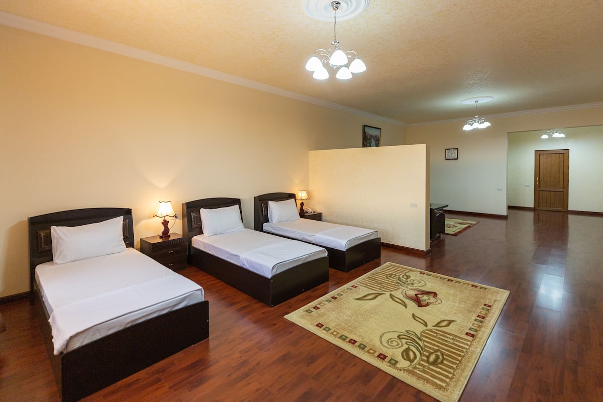 superior triple room | 1 bedroom, in-room safe, desk, laptop workspace