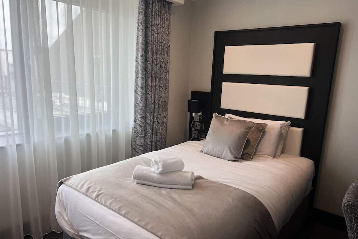 In-room safe, desk, laptop workspace, blackout curtains