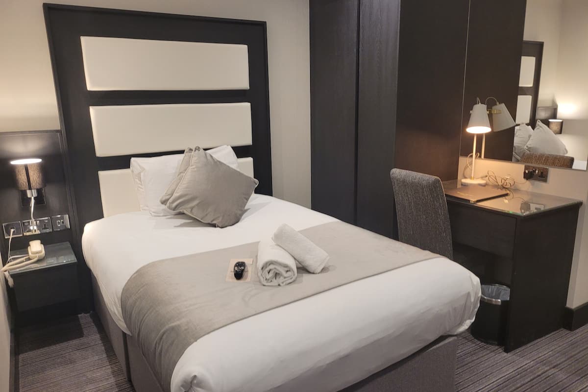 Economy-Einzelzimmer | 1 Schlafzimmer, Zimmersafe, Schreibtisch, laptopgeeigneter Arbeitsplatz