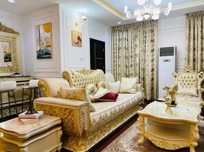 Apartamento superior | Área de estar