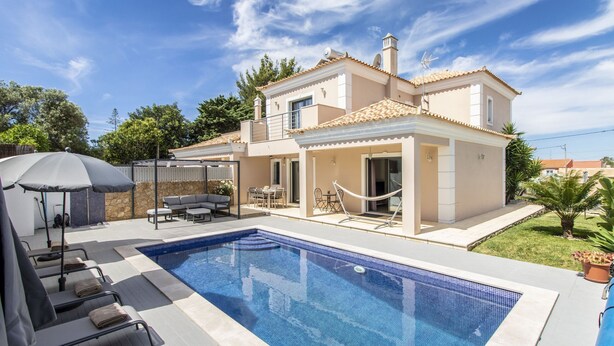A modern two-story house with a swimming pool, outdoor seating, and a well-maintained garden. - Villa Maya | 3 Bedrooms | Modern | Almancil (Almancil)