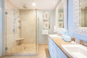 Combined shower/tub, hair dryer, towels, soap